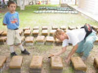 Further staining and letting the cement blocks cure and dry further under the hot Honduran sun