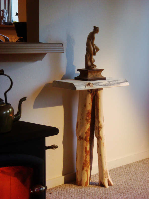 Rustic - yet elegant side table crafted from lodgepole pine