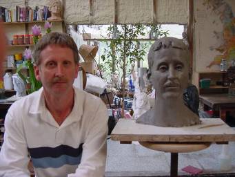 Mr. Paul Morgan with his completed bust in clay