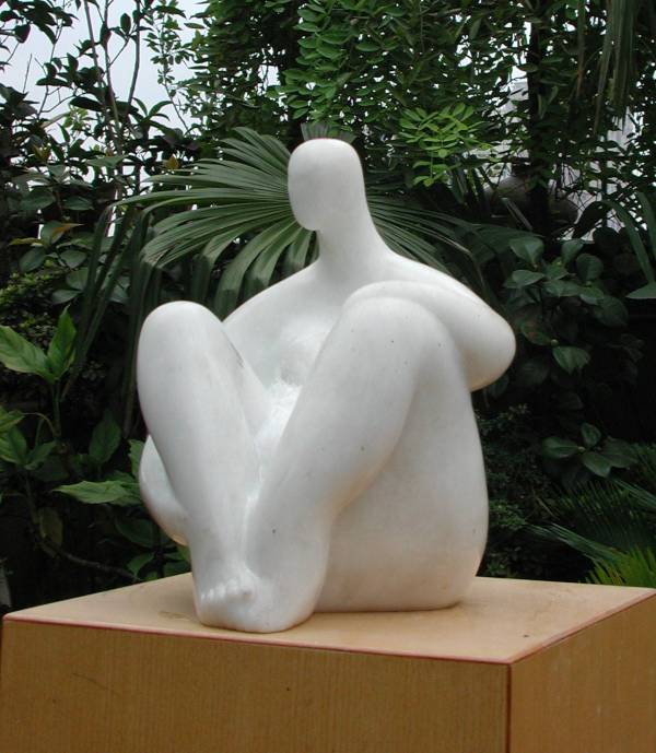 Seated Figure sculpture - mother earth type sculpture shown here in white marble